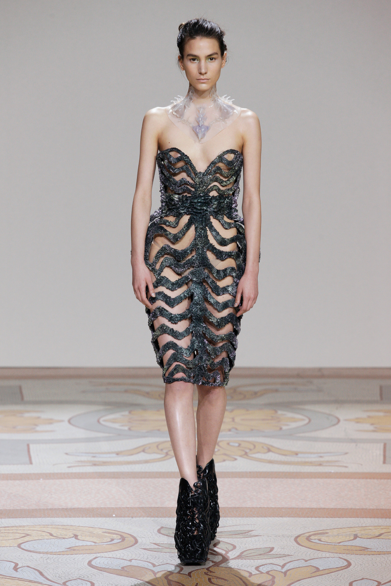Illustration for article titled These metallic dresses were created with iron filings and magnets